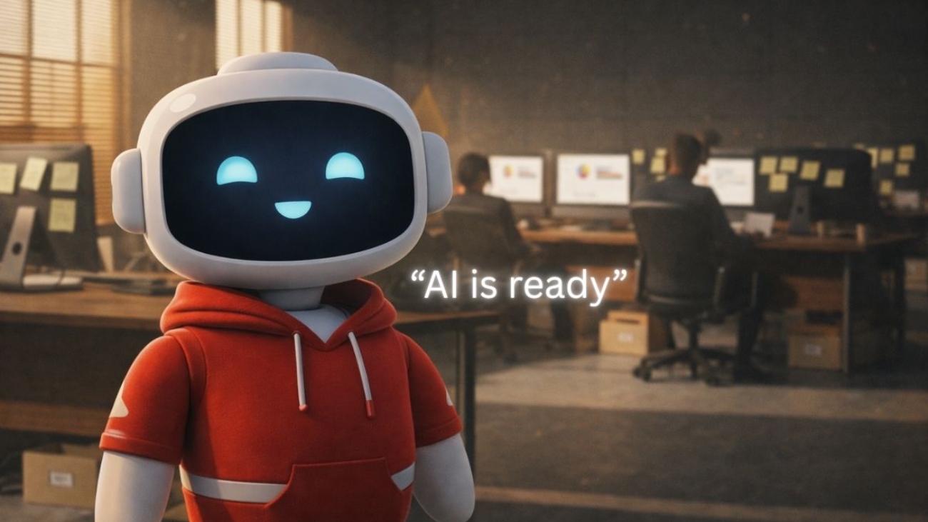 Cute AI agent in a red outfit standing in a modern organizational office, symbolizing AI readiness and understanding inside business environments.